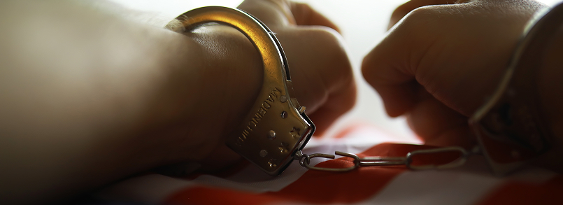 hand in handcuffs